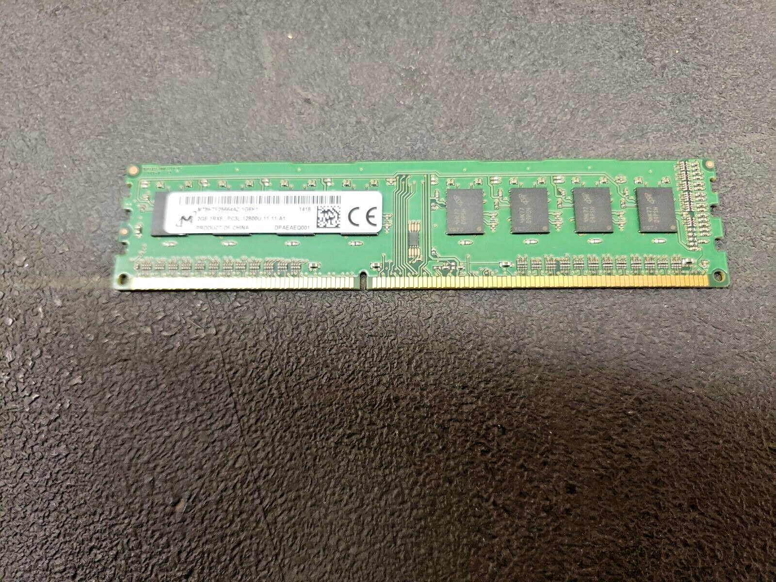 Память Micron DDR3 2GB UDIMM 1600 МТ/с (MT8KTF25664AZ-1G6K1) — фото 1