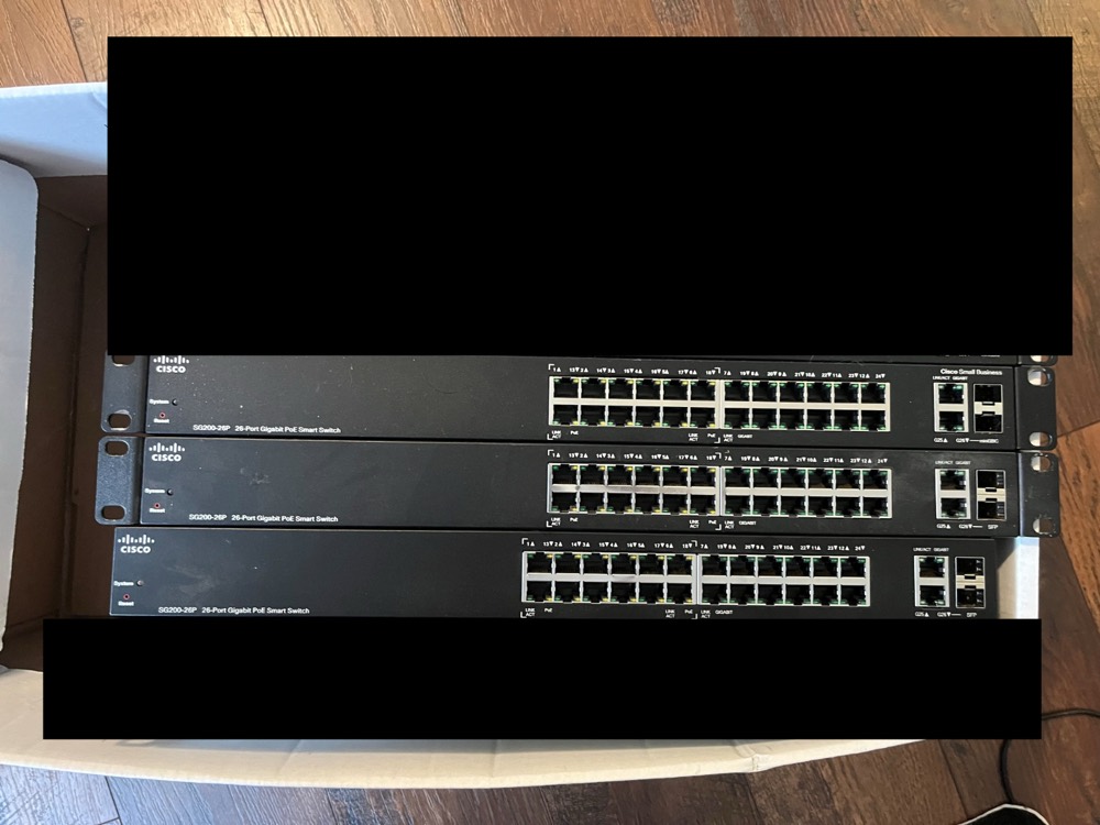 Коммутатор Cisco SG200-26P SLM2024PT — фото 1